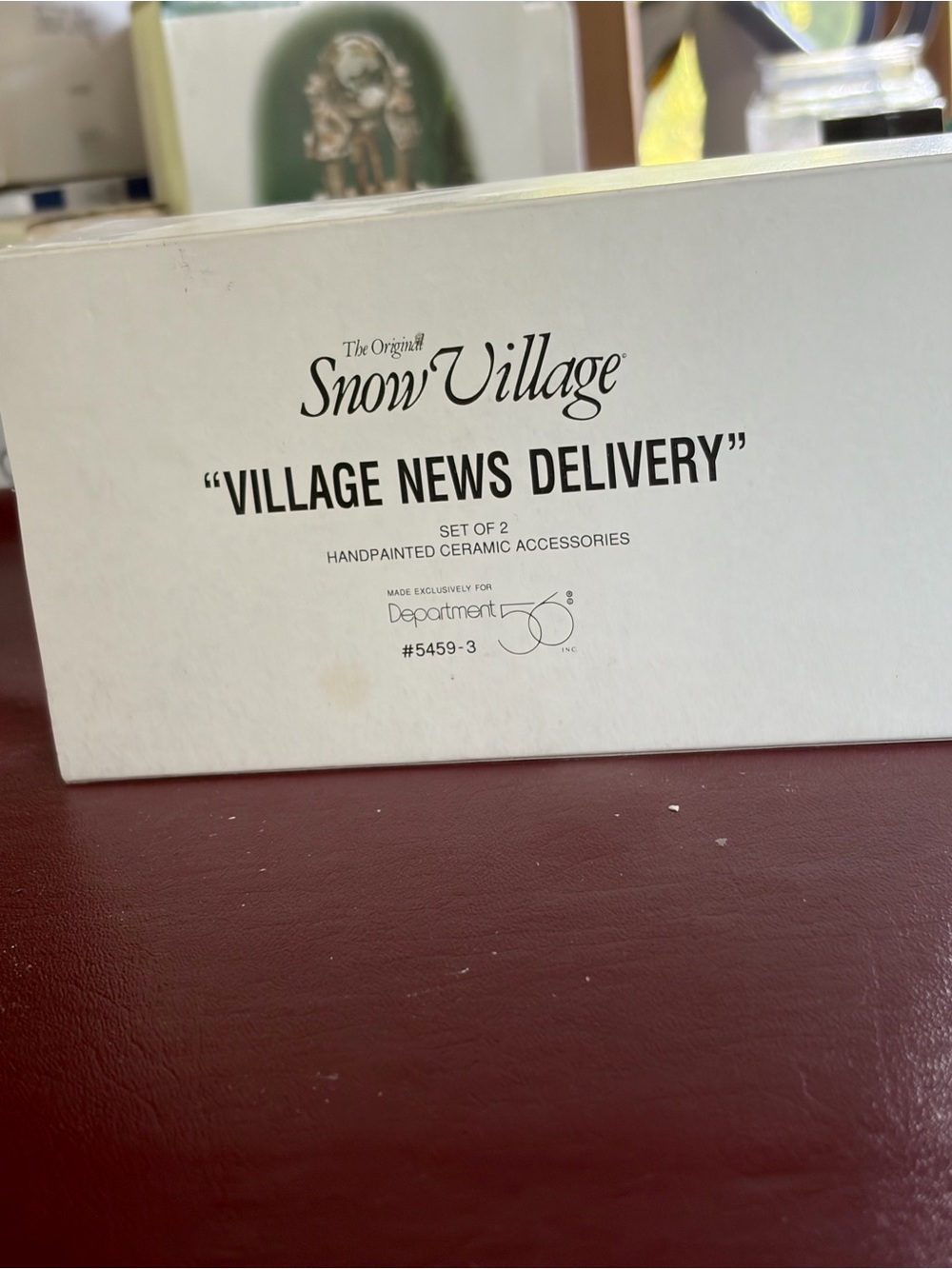 "Village News Delivery” Department 56